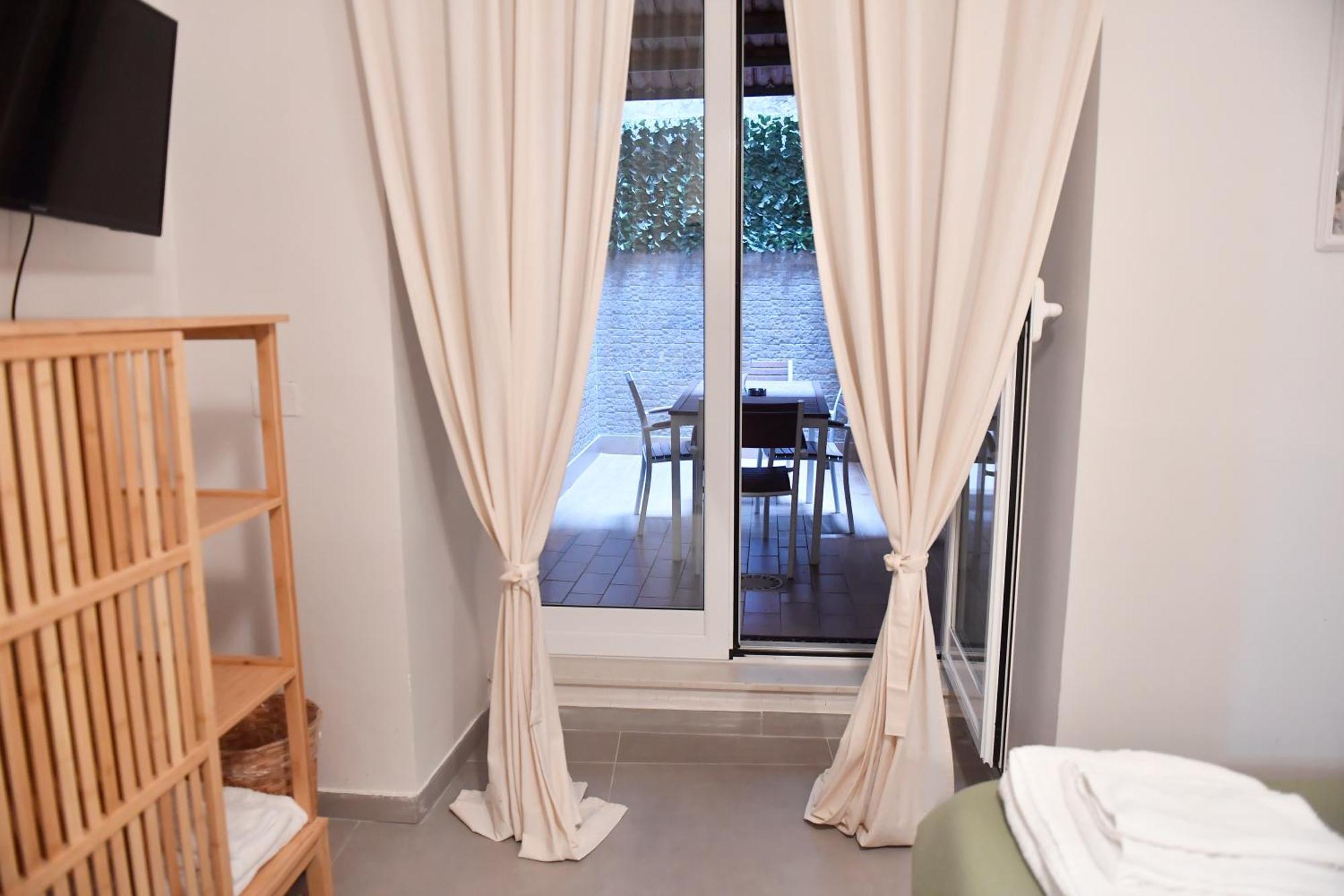 Quadruple Room with Terrace,1630123681:JPEG